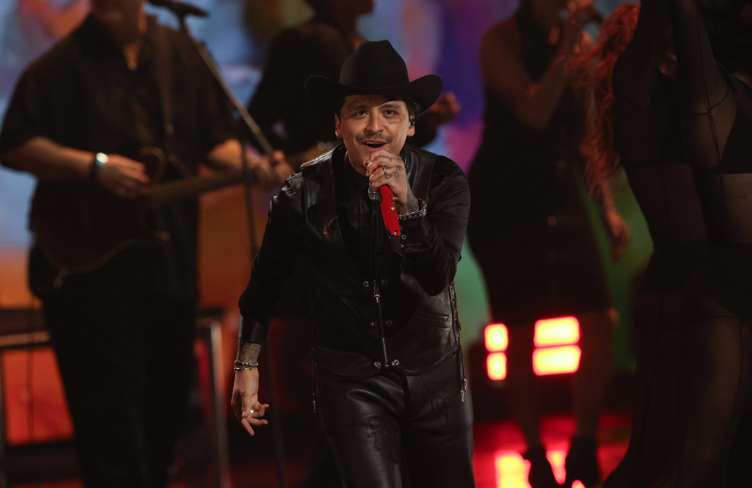 Latin Grammys 2025. Christian Nodal and Angela Aguilar tattoos