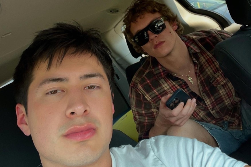 Hudson Williams With Connor Storrie In a Car