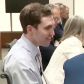 Tyler Robinson seen smiling court during hearing