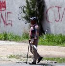 The initials of the CJNG painted on a Jalisco wall